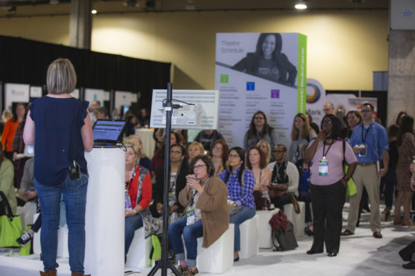 Attendees listening during Showcase